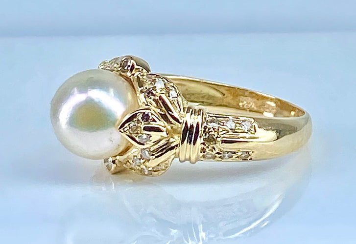 Bague 52 Bague en or jaune 18 carats, perle et 38 diamants 58 Facettes AB448