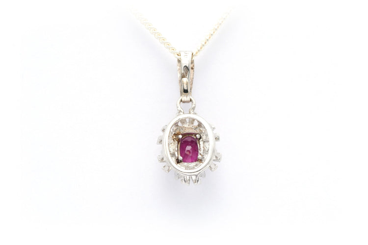 Pendentif Pendentif 1970 en or blanc serti d'un grenat et de diamants 58 Facettes B634