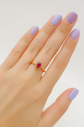 Bague Bague en or jaune avec un saphir rose ovale et des diamants 58 Facettes 50291