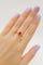 Bague Bague en or jaune avec un saphir rose ovale et des diamants 58 Facettes 50291