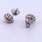 Boucles d'oreilles en or blanc avec rubis et diamants