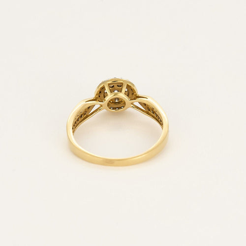 Bague en or jaune et or blanc à motif de fleur, diamants
