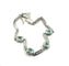 Bracelet Bracelet en or blanc à maillons rectangulaires, diamants et émeraudes 58 Facettes 50399