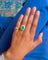 Bague 52 Bague Marguerite en or jaune, émeraude et diamants 58 Facettes