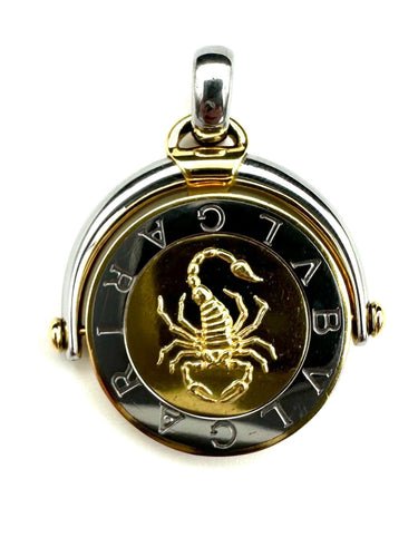 Pendentif BVLGARI. Pendentif vintage or et acier 58 Facettes
