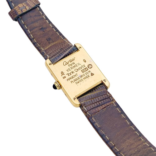 Montre Montre Cartier, "Tank Must" argent plaqué or, cuir. 58 Facettes 34826