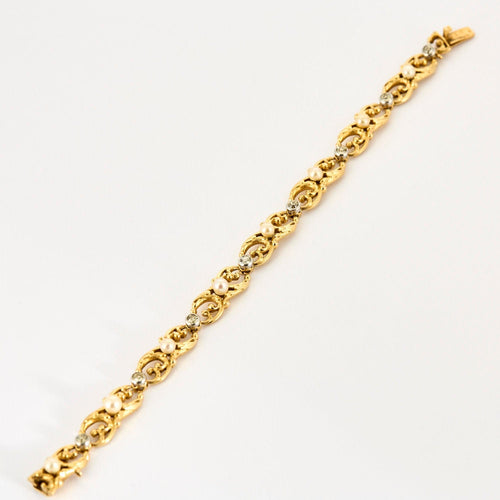 Bracelet Bracelet or jaune et gris, perles et diamants 58 Facettes ENG10572