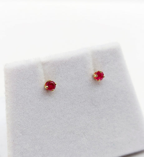 Boucles d'oreilles Puces d'oreilles vintage or jaune et rubis 58 Facettes B01014