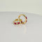 Boucles d'oreilles Boucles d’oreilles créoles avec rubis et diamants en or jaune 14k 58 Facettes 2512013
