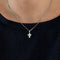 Pendentif CARTIER - Pendentif "Croix" en or blanc et diamants 58 Facettes