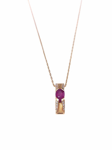 Pendentif en or jaune, rubis et diamant