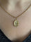 Pendentif Augis - Médaille d'Amour en or jaune et rubis 58 Facettes
