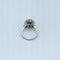 Bague 57 Bague pompadour en or gris, saphir, diamants 58 Facettes