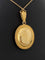 Pendentif Pendentif porte-photo en or jaune serti d'un camée en Agate 58 Facettes