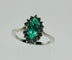 Bague 54 Bague en or blanc avec une émeraude centrale et des diamants 58 Facettes 50272