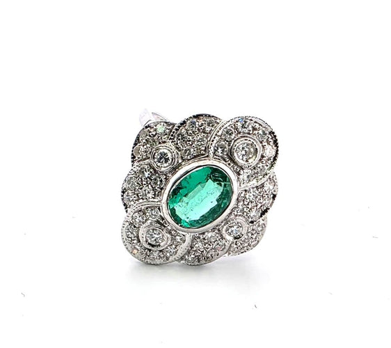Bague 57 Bague en or blanc 18 carats avec une émeraude ovale de 2,00 carats et des diamants de 1,00 carat 58 Facettes