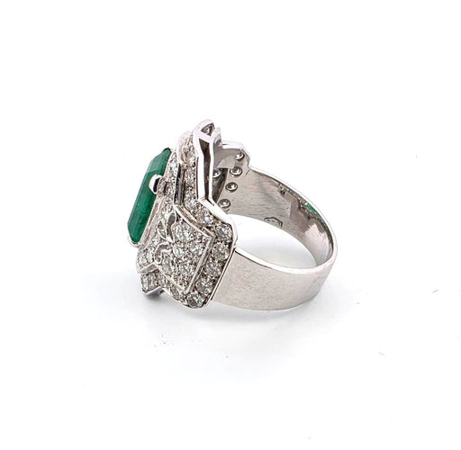 Bague 55 Bague en or blanc avec émeraude et diamants 58 Facettes