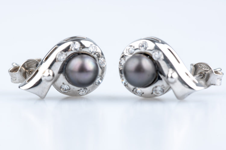 Boucles d'oreilles Boucles d’oreilles perles de Tahiti 6,11 mm & diamants 0,41 ct en or jaune 58 Facettes BO46420-107