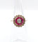 Bague 48 Bague fleur art deco or rose 18k ornée d'un diamant taille brillant entouré de rubis calibrés dans une monture finement travaillée (circa 1920) 58 Facettes A04432