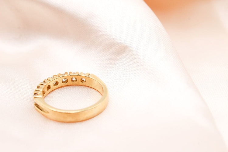 Bague Bague demi-alliance or jaune, 7 diamants 0,70 ct H SI 58 Facettes 250074