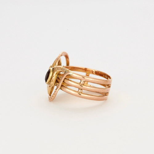 Bague 64 Bague or bicolore motif serpent et grenats 58 Facettes AB44