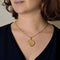 Pendentif Pendentif Porte Souvenir ouvrant en or jaune à motif de fleurs 58 Facettes ALB1894