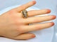 Bague Bague en or jaune 18 carats et pierres précieuses 58 Facettes AB327