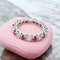Bague 51.5 Bague alliance américaine or blanc diamants et rubis 58 Facettes AA 1670