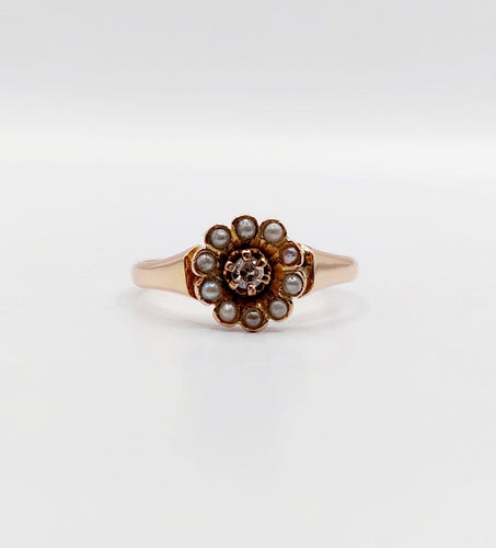 Bague 51.5 Bague marguerite or rose, diamant et perles (circa 1900) 58 Facettes A06283