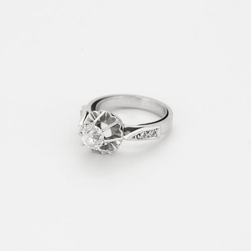 Bague 48 Bague Solitaire en or blanc et diamant 58 Facettes HOU55282