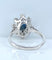 Bague 53 Bague marguerite en or blanc, saphir et diamants 58 Facettes AB644