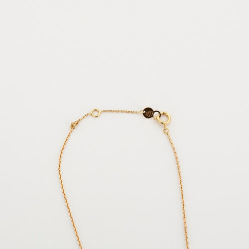 Collier Collier or jaune La Brune et La Blonde émeraude 58 Facettes 43166