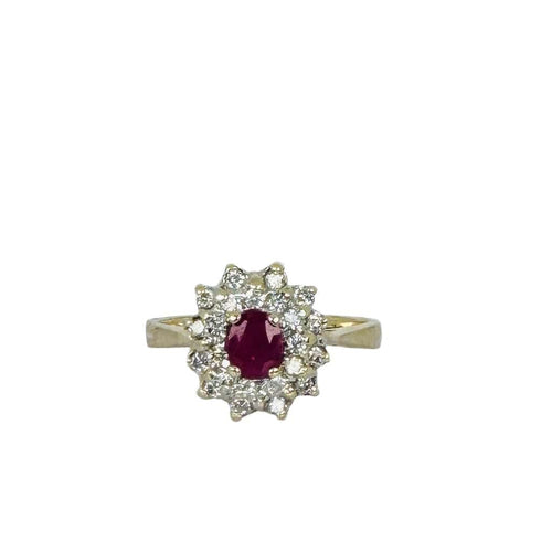Bague Bague entourage en or jaune et blanc avec rubis ovale et diamants 58 Facettes 2212038