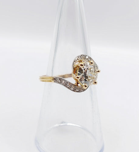 Bague 54.5 Bague tourbillon antique en or 18k et platine, diamant taille ancienne 1,35 ct 58 Facettes A06442