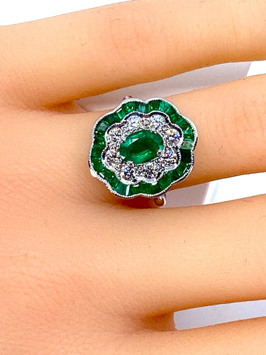 Bague Bague marguerite en or blanc 18 carats en émeraudes et diamants 58 Facettes AB216