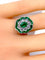 Bague Bague marguerite en or blanc 18 carats en émeraudes et diamants 58 Facettes AB216