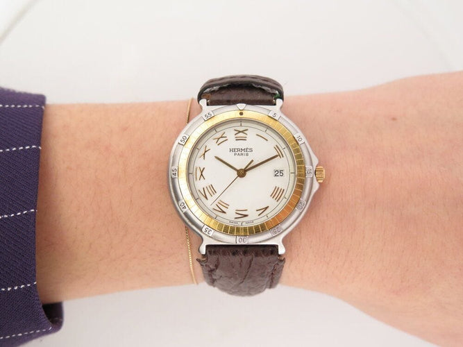 Montre vintage montre HERMES captain nemo quartz 32 mm en or & acier 58 Facettes 266233