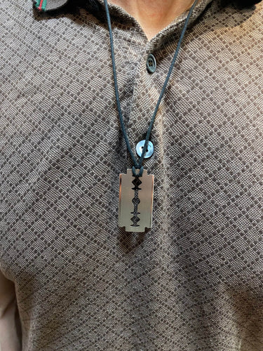 Pendentif Dinh Van - Pendentif "Lame de rasoir" GM sur cordon 58 Facettes 096424105792