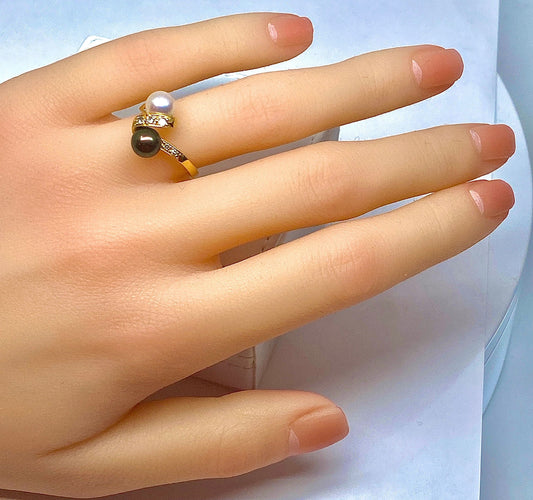 Bague Bague en or jaune 18 carats, perle de Tahiti, perle de culture blanche et diamants 58 Facettes AB264