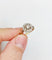 Bague 53.5 Bague marguerite circa 1910 en or 18k, platine et diamants 58 Facettes A06629