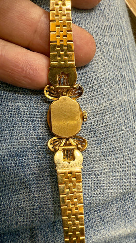 Montre Montre Omega ancienne en or  18 carats et diamants 58 Facettes