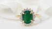 Bague 60 Bague marguerite en or jaune, émeraude ovale et diamants 58 Facettes 30768