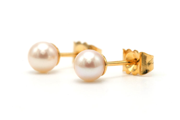 Boucles d'oreilles Boucles d'oreilles contemporaines serties de perles en or jaune 18 carats 58 Facettes 23332
