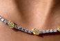 Collier Collier tennis en or blanc 18 carats avec diamants jaunes 58 Facettes G-439