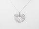 Collier Collier en or blanc et 4 coeurs 58 Facettes 26383