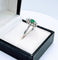 Bague 53 Bague marquise or gris, émeraude, diamant 58 Facettes