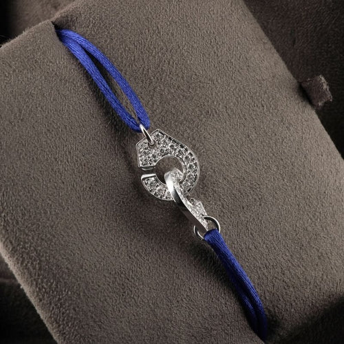 Bracelet Menottes R12 en or blanc et diamants 58 Facettes 341112