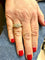 Bague 56 Bague ondulée en or jaune, diamants 58 Facettes