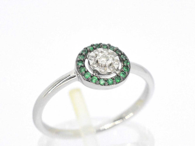 Bague Bague en or blanc avec diamants et émeraude 58 Facettes 2313