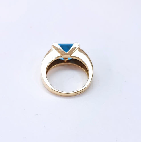 Bague or jaune topaze bleue